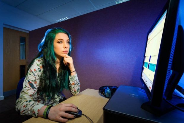 Woman at a desktop computer